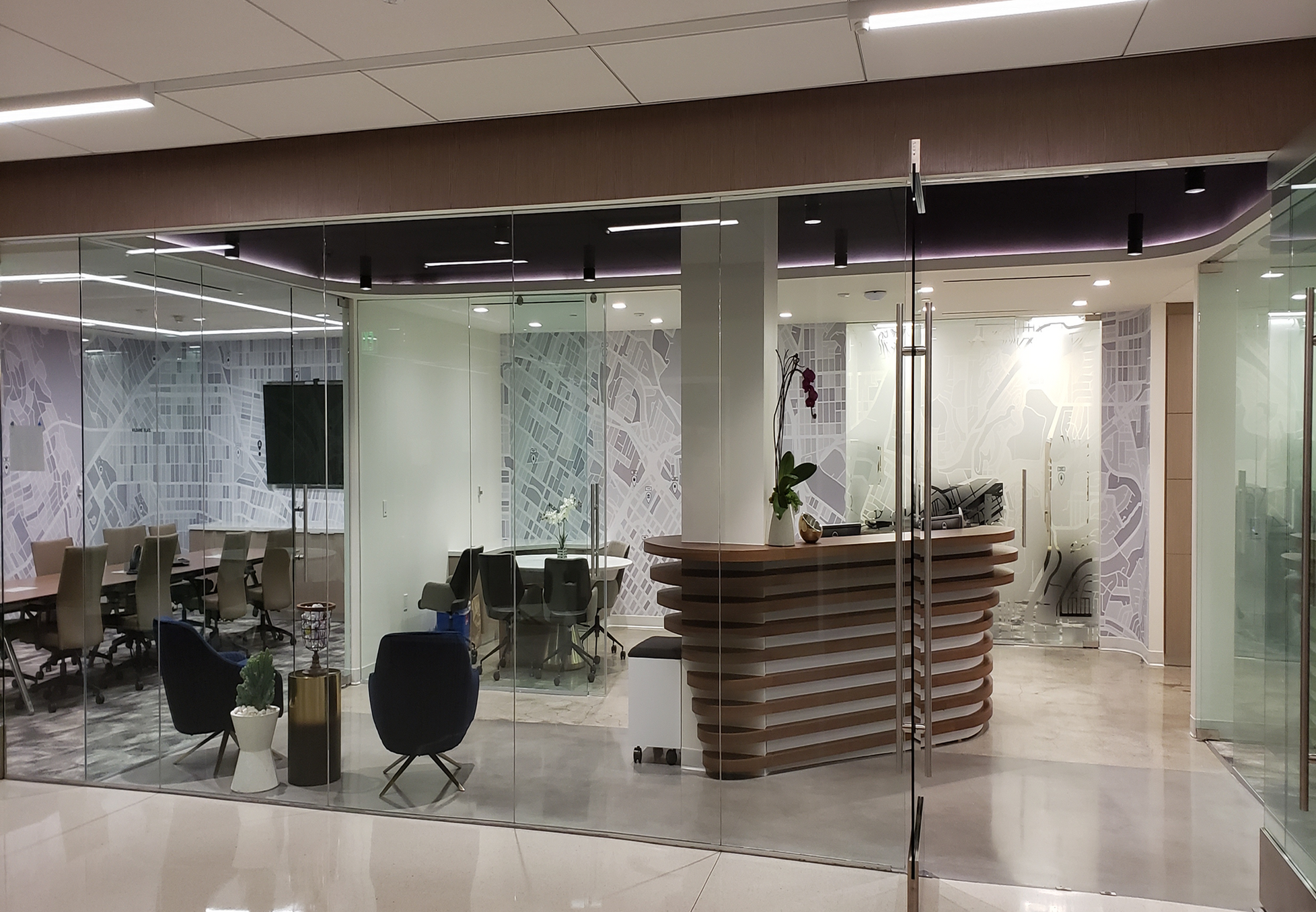 Office interior with custom printed window films for privacy.