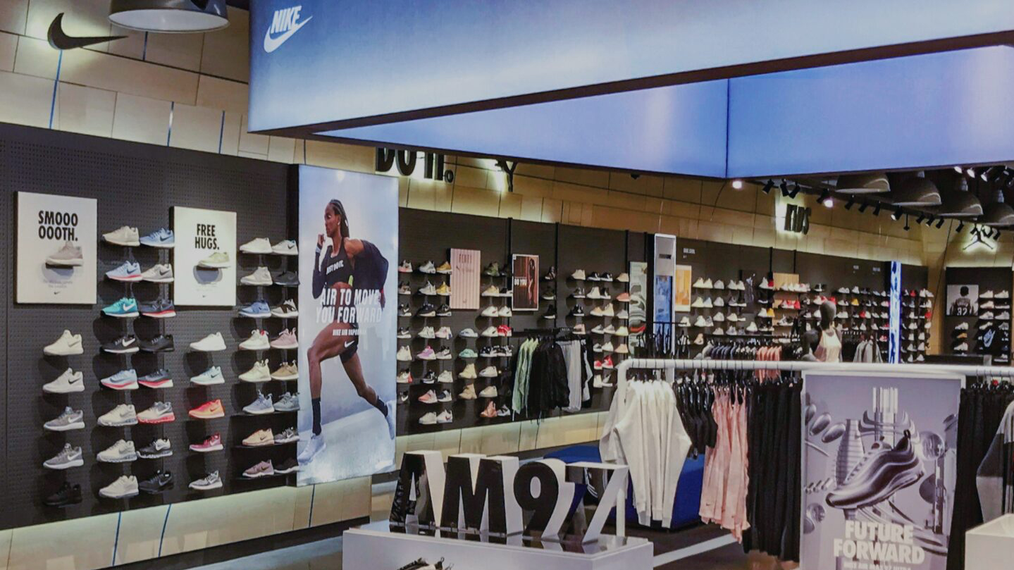 inside of a shoe store featuring Nike shoes and supporting retail environment graphics available at Maverick Printing in Reno.