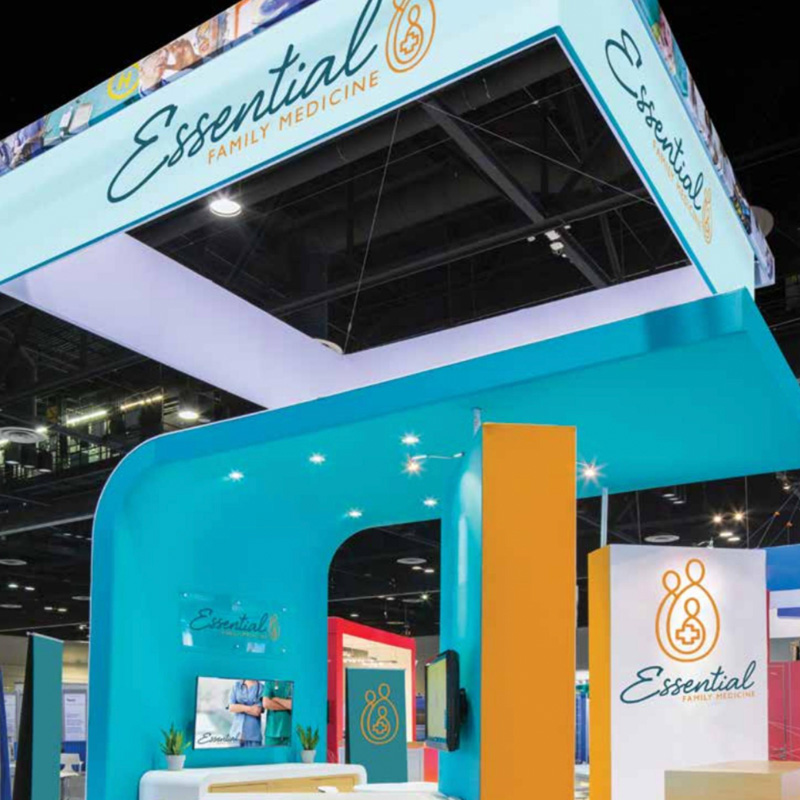 custom trades how booth with arched SEG architecture and mixed media branding.