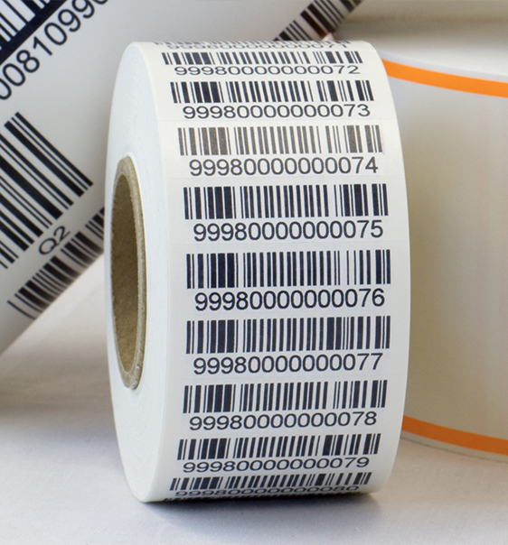 Roll of labels with sequential numbering and barcodes printed in black ink.